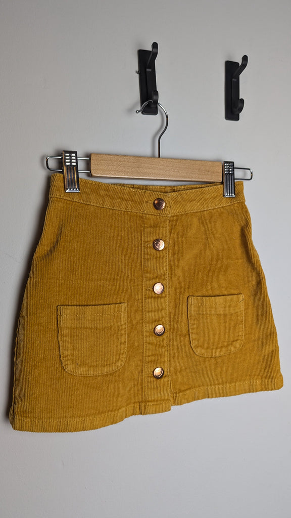 George Mustard Cord Skirt - Girls 3-4 Years Little Ones Preloved Used, Preloved, Preworn & Second Hand Baby, Kids & Children's Clothing UK Online. Cheap affordable. Brands including Next, Joules, Nutmeg Morrisons, TU, F&F, H&M.