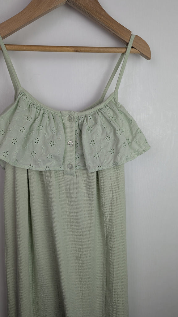 George Sage Green Eyelet Jumpsuit - Girls 5-6 Years Little Ones Preloved Used, Preloved, Preworn Baby, Girls & Boys Clothes. Kids & Children's second hand Clothing UK Online. Cheap affordable. Brands including Next, Joules, Nutmeg Morrisons, TU, F&F, H&M.