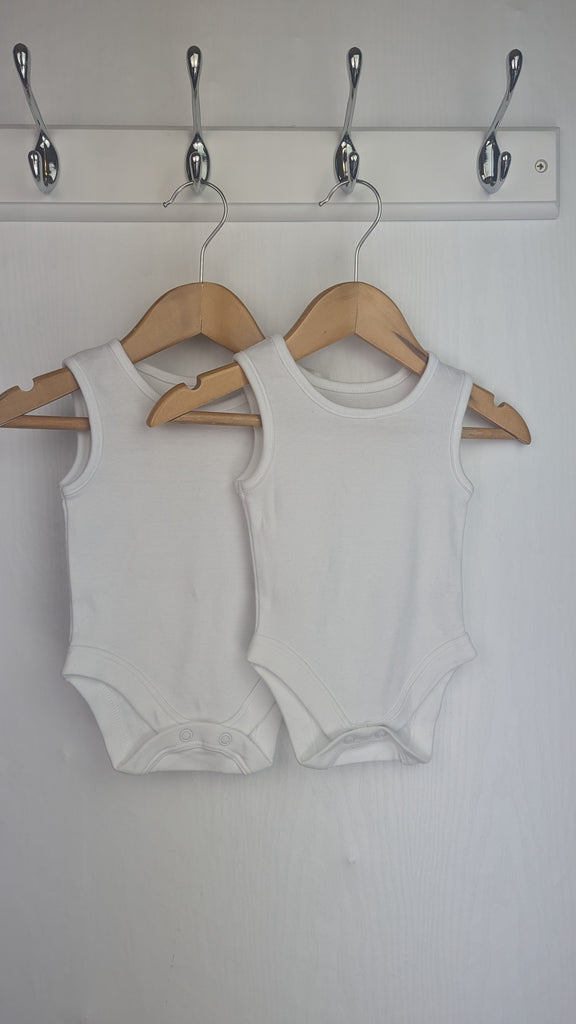 George White Vest Bodysuits - Unisex 0-3 Months George Used, Preloved, Preworn & Second Hand Baby, Kids & Children's Clothing UK Online. Cheap affordable. Brands including Next, Joules, Nutmeg Morrisons, TU, F&F, H&M.