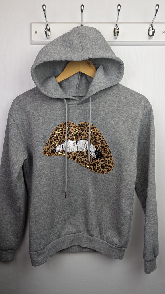 Grey Leopard Print Lips Jumper - Girls 12 Years Unbranded Used, Preloved, Preworn Baby, Girls & Boys Clothes. Kids & Children's second hand Clothing UK Online. Cheap affordable. Brands including Next, Joules, Nutmeg Morrisons, TU, F&F, H&M.