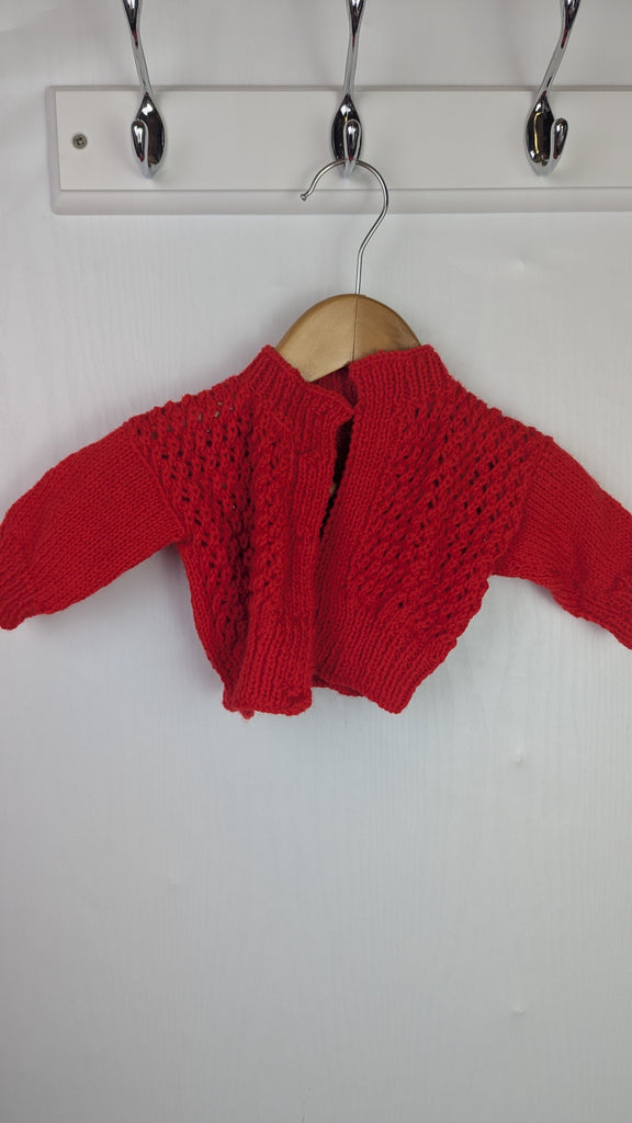 Handmade Red Knitted Cardigan - Girls Newborn Little Ones Preloved Used, Preloved, Preworn Baby, Girls & Boys Clothes. Kids & Children's second hand Clothing UK Online. Cheap affordable. Brands including Next, Joules, Nutmeg Morrisons, TU, F&F, H&M.