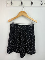H&M Black Palm Tree Shorts - Girls 9 - 10 Years - Little Ones Preloved. Second Hand Children's & Preloved Baby, Kids, Girls & Boys Clothes. UK online