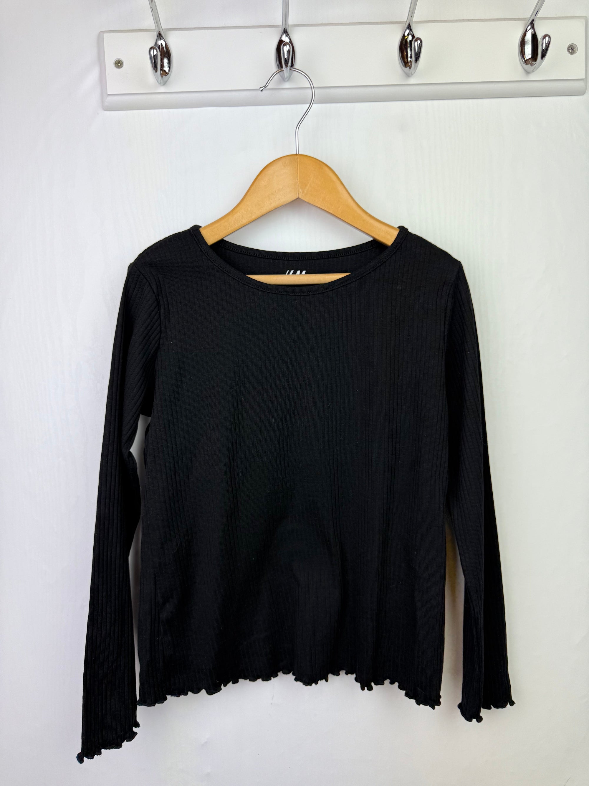 H&M Black Ribbed Long Sleeve Top - Girls 6 - 8 Years - Little Ones Preloved. Second Hand Children's & Preloved Baby, Kids, Girls & Boys Clothes. UK online