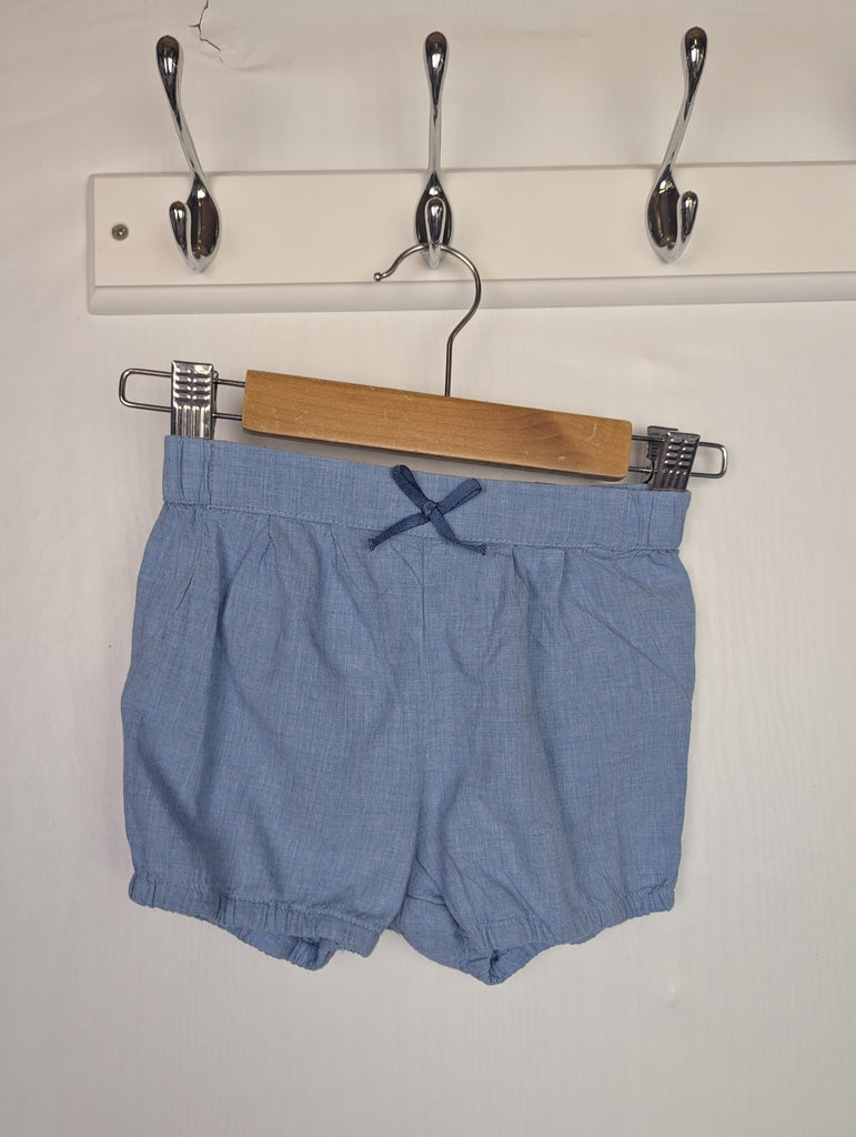 H&M Blue Bow Shorts - Girls 9-12 Months Little Ones Preloved Used, Preloved, Preworn Baby, Girls & Boys Clothes. Kids & Children's second hand Clothing UK Online. Cheap affordable. Brands including Next, Joules, Nutmeg Morrisons, TU, F&F, H&M.