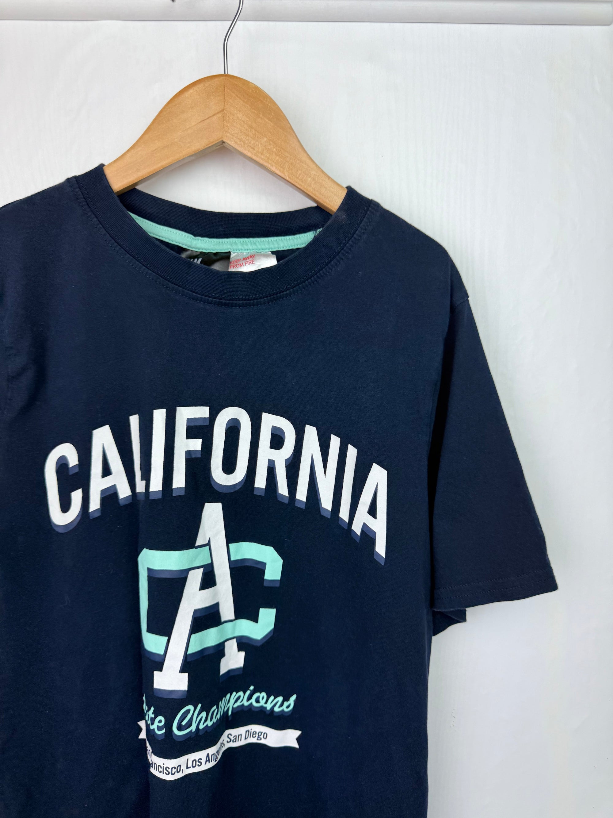 H&M California Short Sleeve Top - Unisex 12 - 14 Years - Little Ones Preloved. Second Hand Children's & Preloved Baby, Kids, Girls & Boys Clothes. UK online