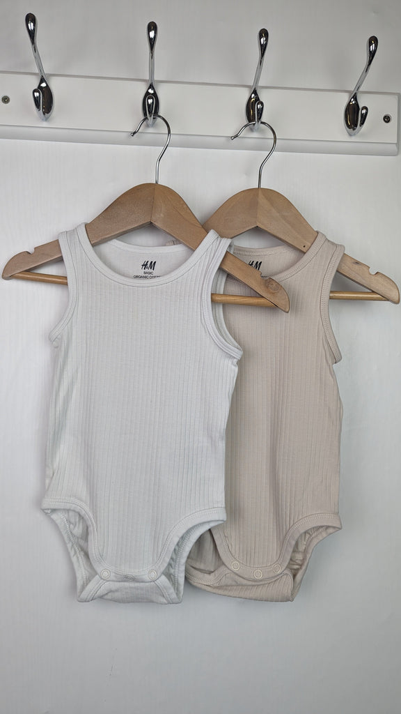 H&M Cream & Beige Ribbed Bodysuits - Unisex 6-9 Months Little Ones Preloved Used, Preloved, Preworn & Second Hand Baby, Kids & Children's Clothing UK Online. Cheap affordable. Brands including Next, Joules, Nutmeg Morrisons, TU, F&F, H&M.