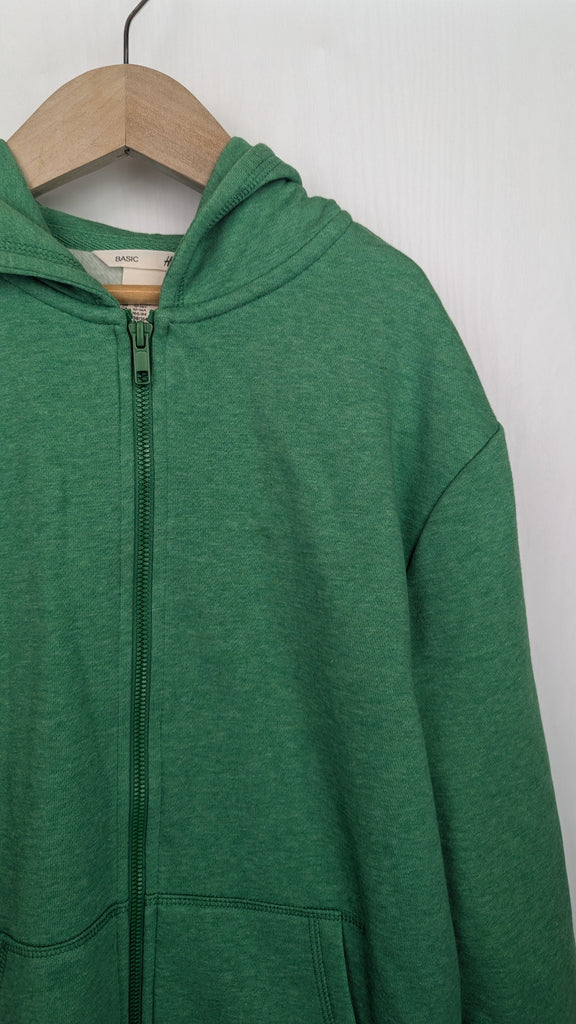 H&M Green Zip Hoodie - Unisex 12-14 Years H&M Used, Preloved, Preworn & Second Hand Baby, Kids & Children's Clothing UK Online. Cheap affordable. Brands including Next, Joules, Nutmeg Morrisons, TU, F&F, H&M.