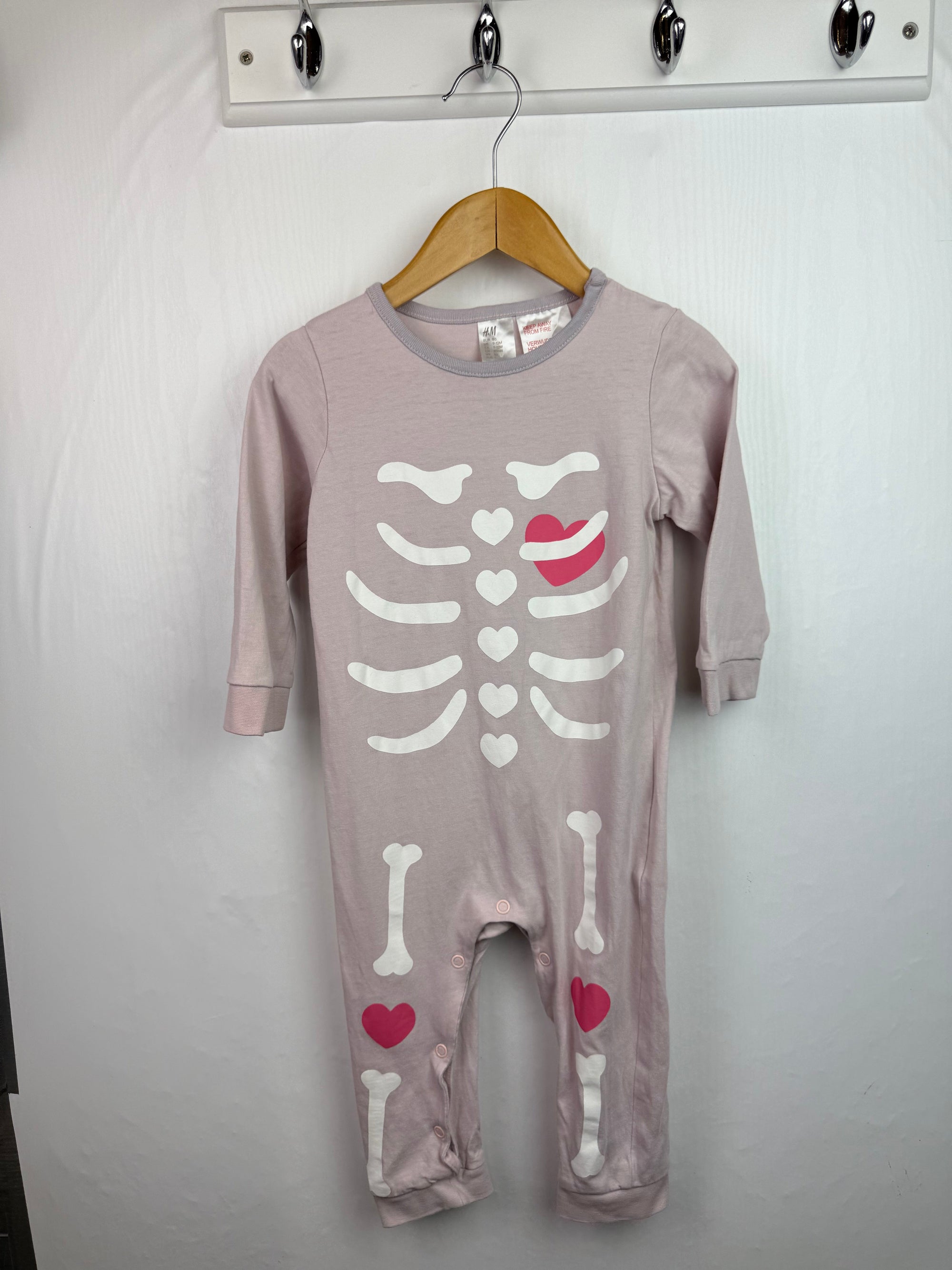 H&M Pink Skeleton Romper - Girls 9 - 12 Months - Little Ones Preloved. Second Hand Children's & Preloved Baby, Kids, Girls & Boys Clothes. UK online