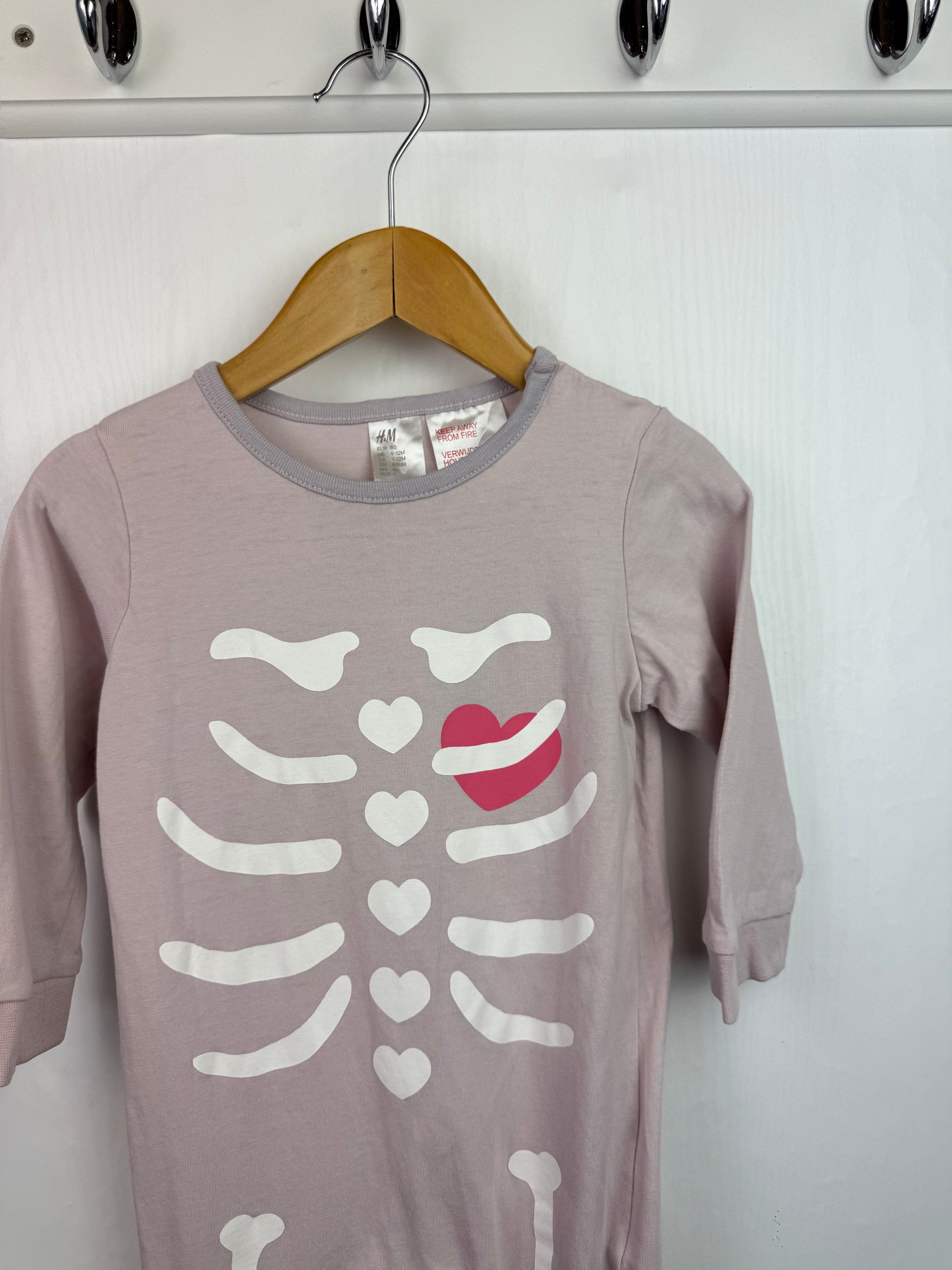 H&M Pink Skeleton Romper - Girls 9 - 12 Months - Little Ones Preloved. Second Hand Children's & Preloved Baby, Kids, Girls & Boys Clothes. UK online
