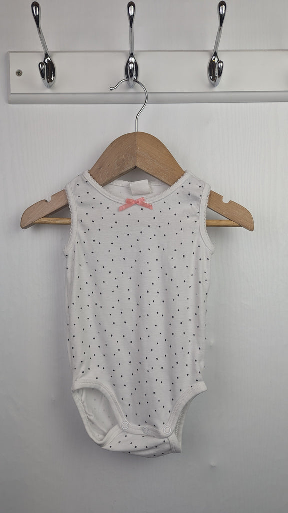 H&M Sleeveless Spot Bodysuit - Girls 4-6 Months Little Ones Preloved Used, Preloved, Preworn & Second Hand Baby, Kids & Children's Clothing UK Online. Cheap affordable. Brands including Next, Joules, Nutmeg Morrisons, TU, F&F, H&M.