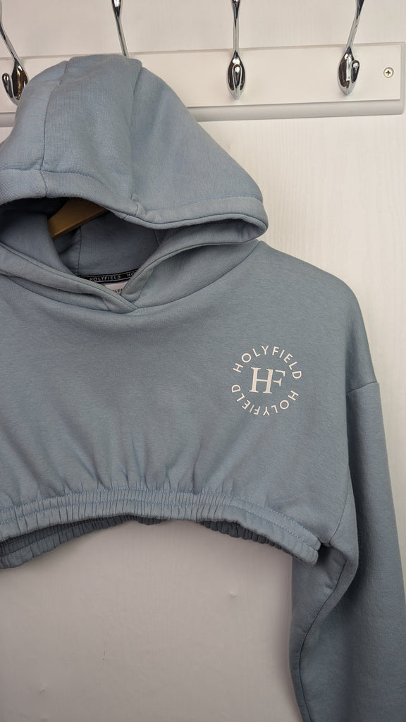 Holyfield Girls Blue Pullover Crop Hoodie - Girls 14-16 Years Holyfield Used, Preloved, Preworn Baby, Girls & Boys Clothes. Kids & Children's second hand Clothing UK Online. Cheap affordable. Brands including Next, Joules, Nutmeg Morrisons, TU, F&F, H&M.