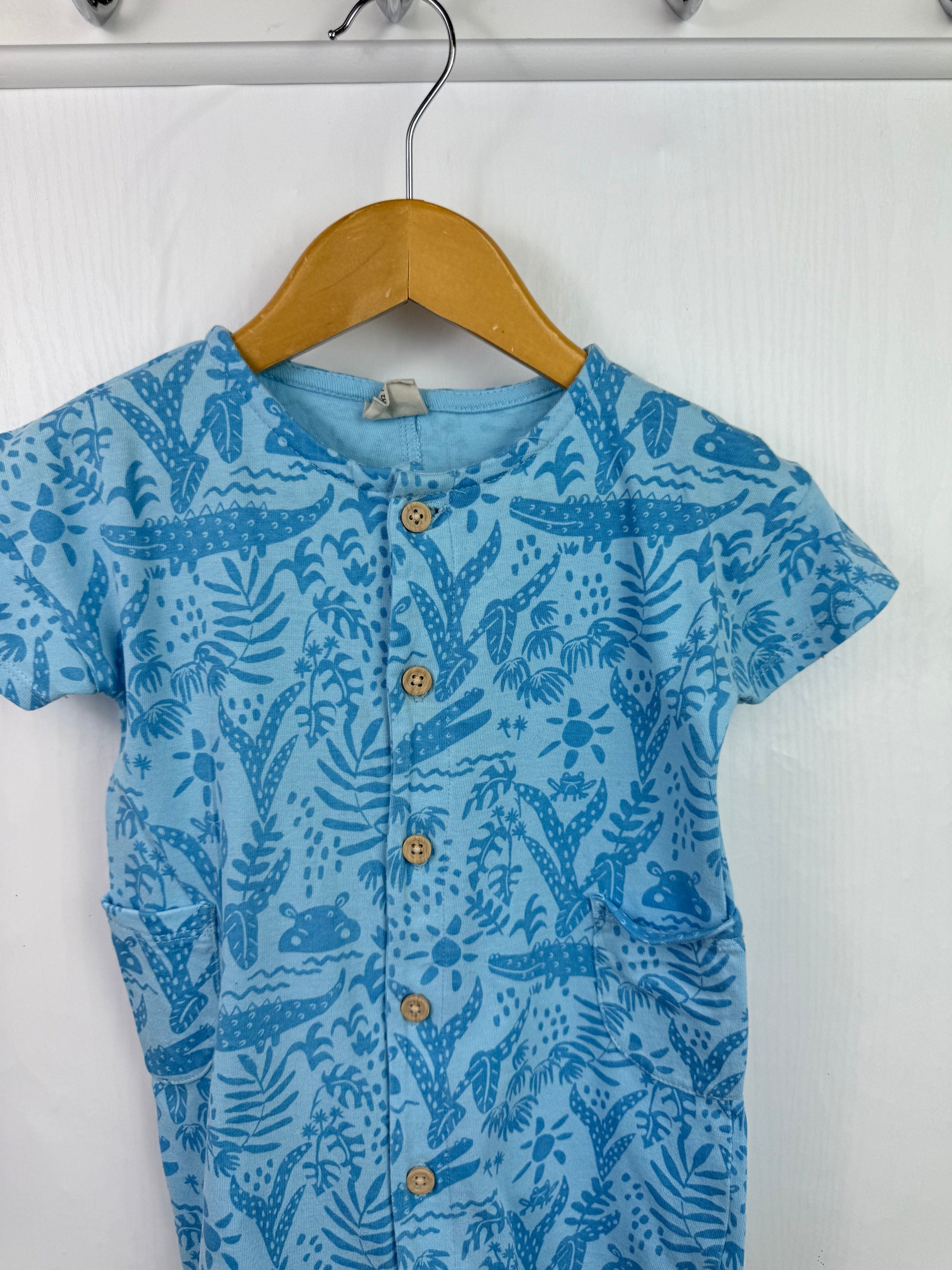 John Lewis Blue Rain Forest Romper - Boys 9 - 12 Months - Little Ones Preloved. Second Hand Children's & Preloved Baby, Kids, Girls & Boys Clothes. UK online