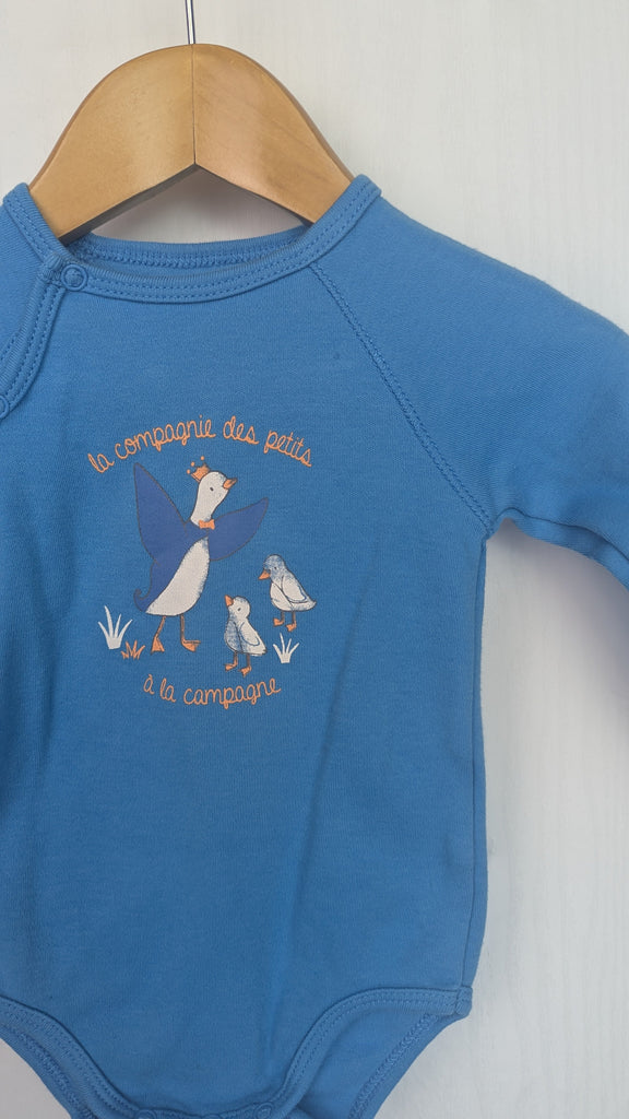 La Compagnie Des Petits Blue Duck Bodysuit - Unisex 3 Months La Compagnie Des Petits Used, Preloved, Preworn & Second Hand Baby, Kids & Children's Clothing UK Online. Cheap affordable. Brands including Next, Joules, Nutmeg Morrisons, TU, F&F, H&M.