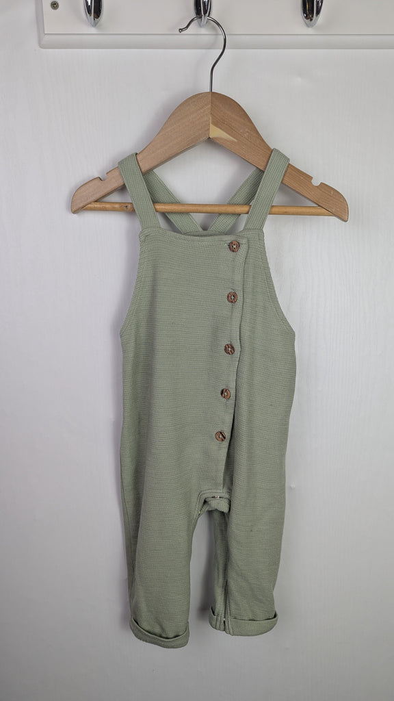 Matalan Green Button Romper - Boys 6-9 Months Little Ones Preloved Used, Preloved, Preworn Baby, Girls & Boys Clothes. Kids & Children's second hand Clothing UK Online. Cheap affordable. Brands including Next, Joules, Nutmeg Morrisons, TU, F&F, H&M.