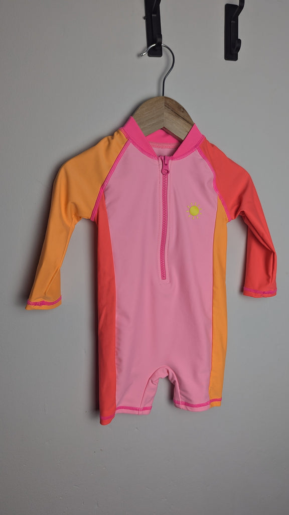 Matalan Pink & Orange Swimsuit - Girls 6-9 Months Little Ones Preloved Used, Preloved, Preworn Baby, Girls & Boys Clothes. Kids & Children's second hand Clothing UK Online. Cheap affordable. Brands including Next, Joules, Nutmeg Morrisons, TU, F&F, H&M.