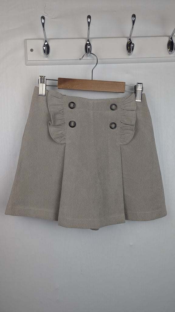 Mayoral Beige Cord Button Skort - Girls 9 Years Little Ones Preloved Used, Preloved, Preworn Baby, Girls & Boys Clothes. Kids & Children's second hand Clothing UK Online. Cheap affordable. Brands including Next, Joules, Nutmeg Morrisons, TU, F&F, H&M.