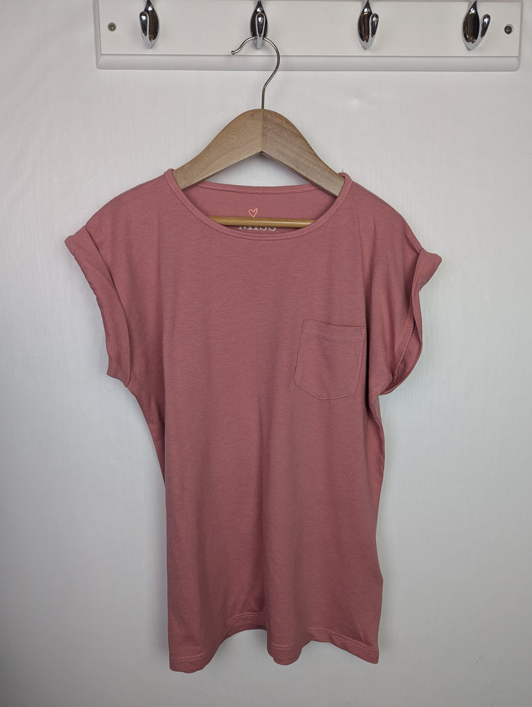 Miss Evie Pink Pocket Top - Girls 9-10 Years Little Ones Preloved Used, Preloved, Preworn Baby, Girls & Boys Clothes. Kids & Children's second hand Clothing UK Online. Cheap affordable. Brands including Next, Joules, Nutmeg Morrisons, TU, F&F, H&M.