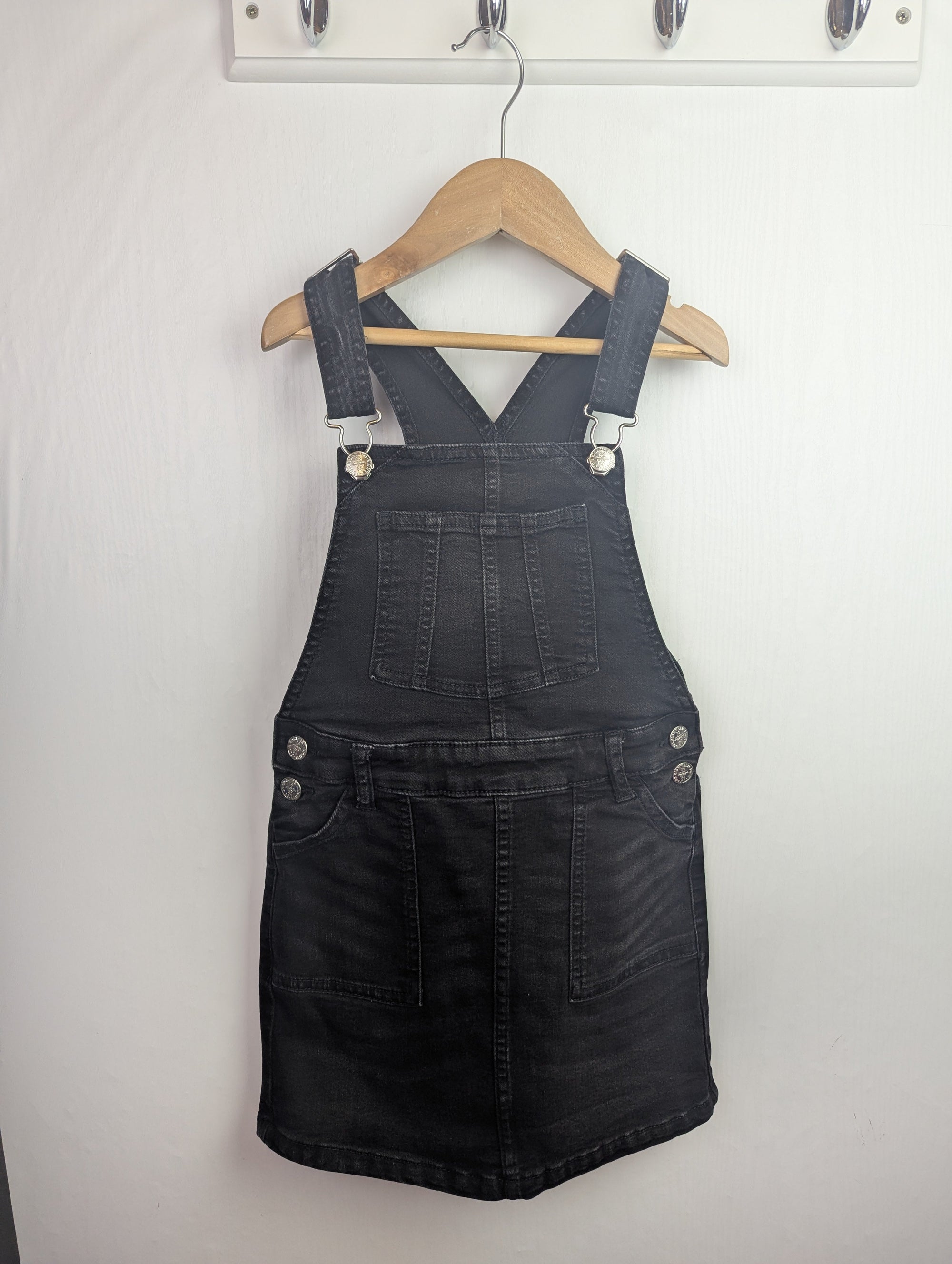 M&S Black Dungaree Dress - Girls 7 - 8 Years - Little Ones Preloved. Second Hand Children's & Preloved Baby, Kids, Girls & Boys Clothes. UK online