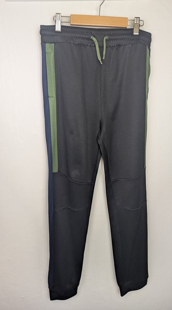 M&S Black & Green Jogging Bottoms - Boys 13-14 Years Little Ones Preloved Used, Preloved, Preworn Baby, Girls & Boys Clothes. Kids & Children's second hand Clothing UK Online. Cheap affordable. Brands including Next, Joules, Nutmeg Morrisons, TU, F&F, H&M.