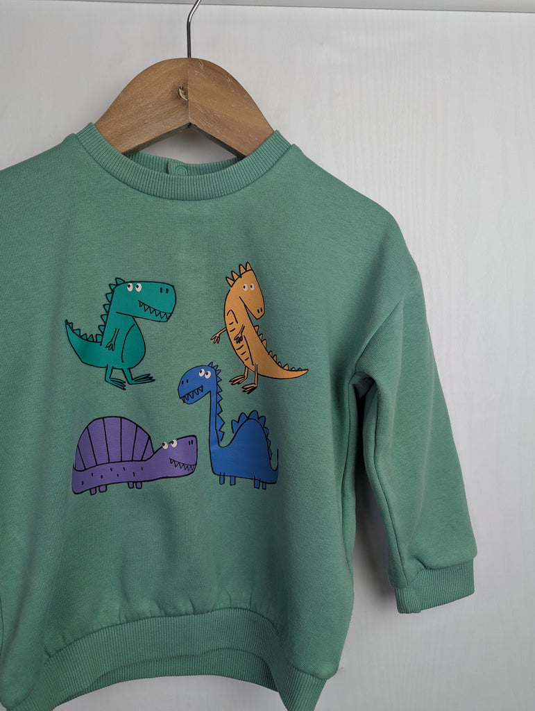 M&S Green Dinosaur Jumper - Boys 18-24 Months Little Ones Preloved Used, Preloved, Preworn Baby, Girls & Boys Clothes. Kids & Children's second hand Clothing UK Online. Cheap affordable. Brands including Next, Joules, Nutmeg Morrisons, TU, F&F, H&M.