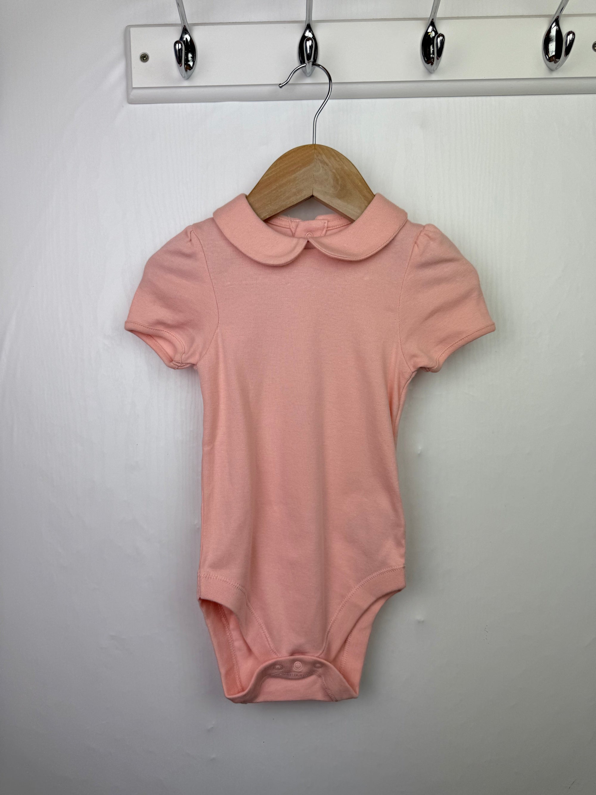 M&S Pink Peter Rabbit Bodysuit - Girls 12 - 18 Months - Little Ones Preloved. Second Hand Children's & Preloved Baby, Kids, Girls & Boys Clothes. UK online