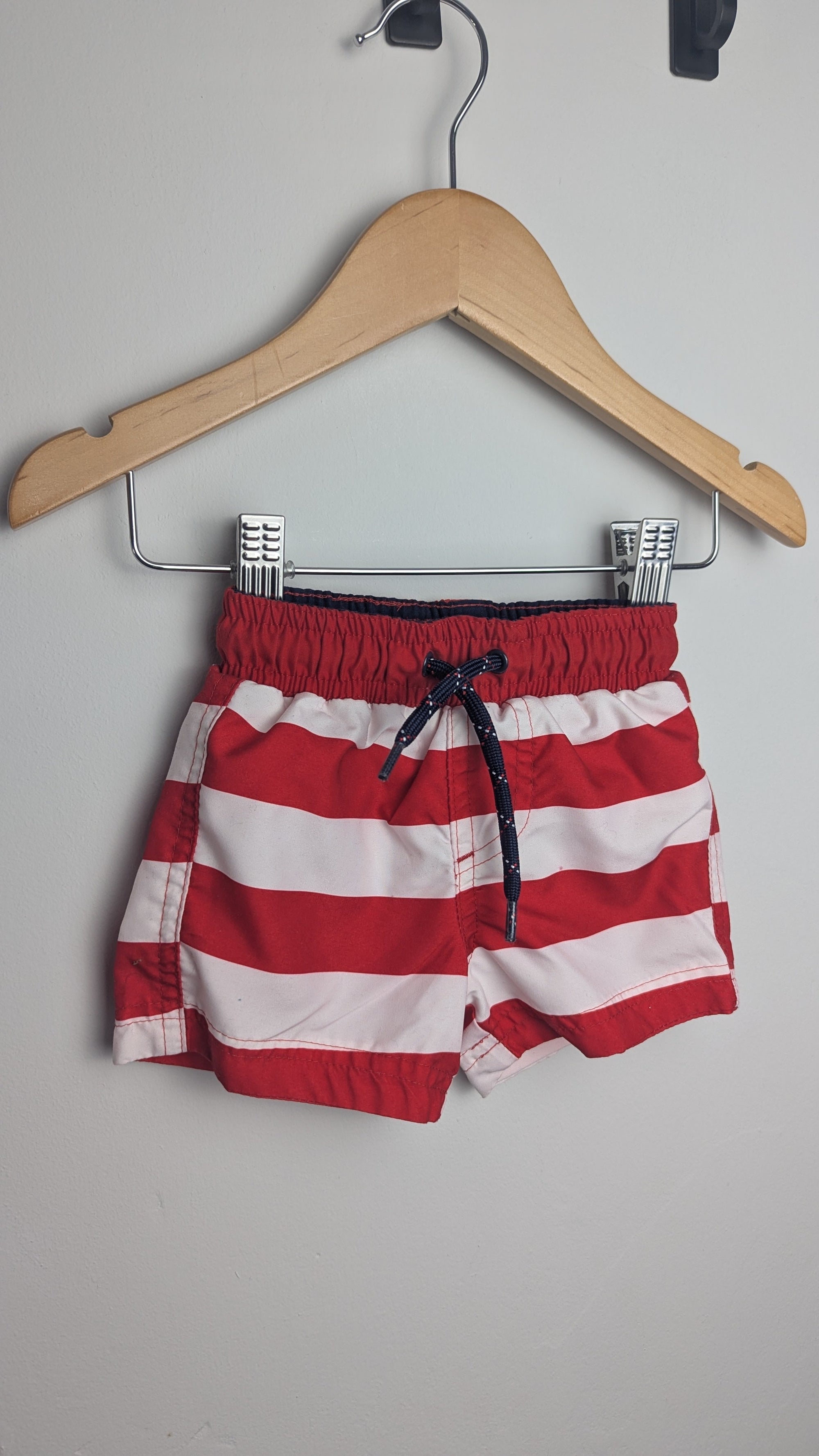 M&S Red & White Striped Swim Shorts - Boys 3 - 6 Months - Little Ones Preloved. Second Hand Children's & Preloved Baby, Kids, Girls & Boys Clothes. UK online