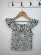 M&S Shirred Ruffle Top - Girls 9 - 10 Years - Little Ones Preloved. Second Hand Children's & Preloved Baby, Kids, Girls & Boys Clothes. UK online