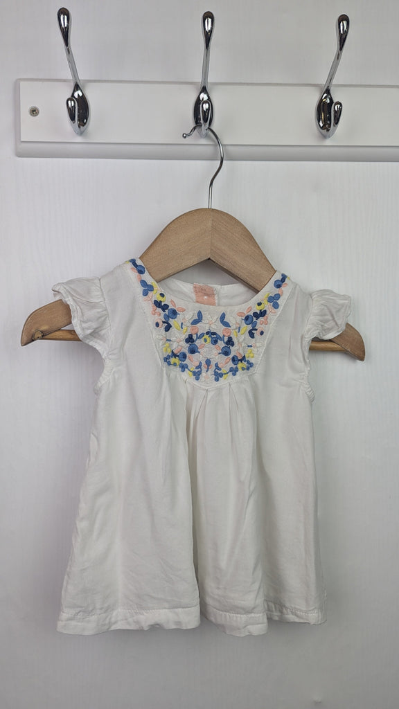 M&S Sleeveless Floral Top - Girls 3-6 Months Little Ones Preloved Used, Preloved, Preworn & Second Hand Baby, Kids & Children's Clothing UK Online. Cheap affordable. Brands including Next, Joules, Nutmeg Morrisons, TU, F&F, H&M.