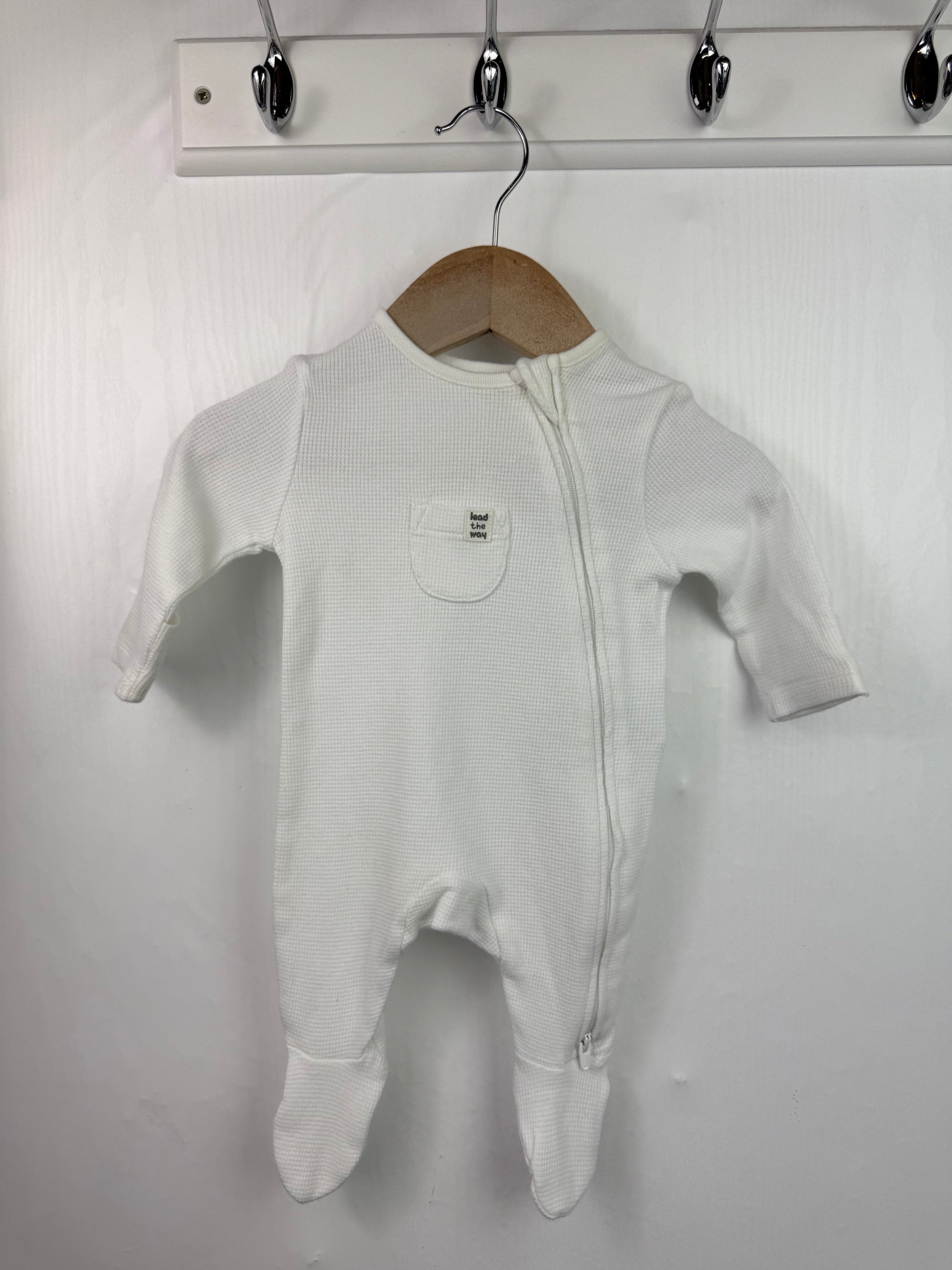 M&S White Waffle Zip Sleepsuit - Unisex 0 - 1 Month - Little Ones Preloved. Second Hand Children's & Preloved Baby, Kids, Girls & Boys Clothes. UK online