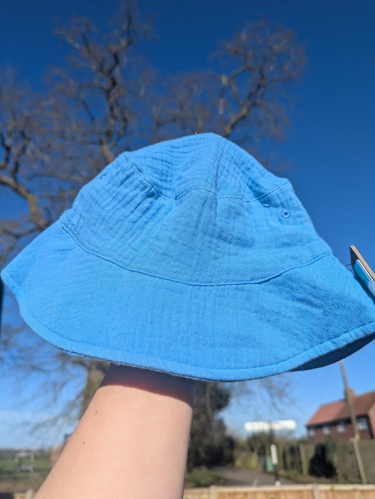 NEW Ex-M*S Blue Muslin Hat - Boys 3-6 Years Little Ones Preloved Used, Preloved, Preworn Baby, Girls & Boys Clothes. Kids & Children's second hand Clothing UK Online. Cheap affordable. Brands including Next, Joules, Nutmeg Morrisons, TU, F&F, H&M.