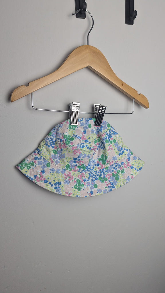 NEW M&S Floral Bucket Hat - Girls 12-18 Months Little Ones Preloved Used, Preloved, Preworn Baby, Girls & Boys Clothes. Kids & Children's second hand Clothing UK Online. Cheap affordable. Brands including Next, Joules, Nutmeg Morrisons, TU, F&F, H&M.