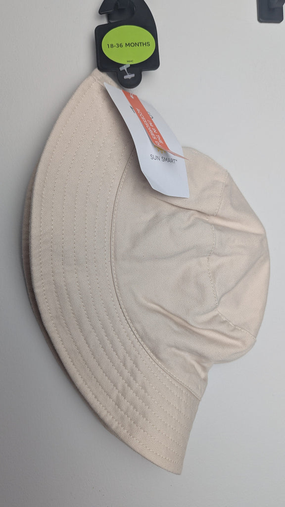 NEW M&S Plain Beige Bucket Hat - Unisex 12-18 Months Little Ones Preloved Used, Preloved, Preworn Baby, Girls & Boys Clothes. Kids & Children's second hand Clothing UK Online. Cheap affordable. Brands including Next, Joules, Nutmeg Morrisons, TU, F&F, H&M.