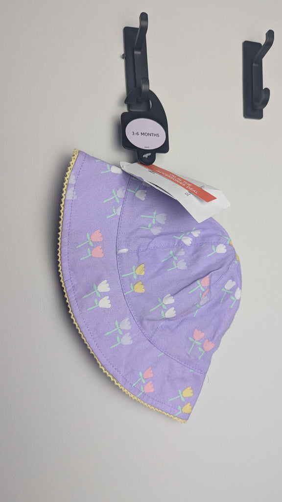 NEW M&S Purple Floral Sun Hat - 0-3 Months Little Ones Preloved Used, Preloved, Preworn Baby, Girls & Boys Clothes. Kids & Children's second hand Clothing UK Online. Cheap affordable. Brands including Next, Joules, Nutmeg Morrisons, TU, F&F, H&M.