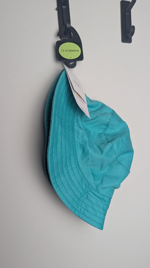 NEW M&S Turquoise Bucket Hat - Unisex 12-18 Months Little Ones Preloved Used, Preloved, Preworn Baby, Girls & Boys Clothes. Kids & Children's second hand Clothing UK Online. Cheap affordable. Brands including Next, Joules, Nutmeg Morrisons, TU, F&F, H&M.