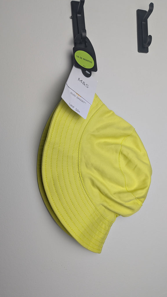 NEW M&S Yellow Bucket Hat - Unisex 18-36 Months Little Ones Preloved Used, Preloved, Preworn Baby, Girls & Boys Clothes. Kids & Children's second hand Clothing UK Online. Cheap affordable. Brands including Next, Joules, Nutmeg Morrisons, TU, F&F, H&M.