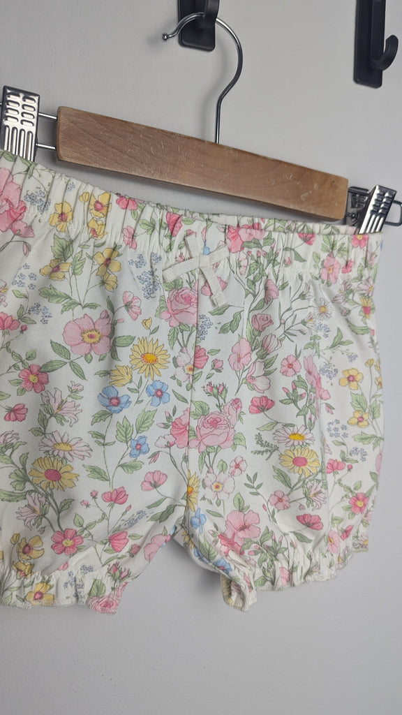 NEW Next Cream Floral Shorts - Girls 6-9 Months Little Ones Preloved Used, Preloved, Preworn & Second Hand Baby, Kids & Children's Clothing UK Online. Cheap affordable. Brands including Next, Joules, Nutmeg Morrisons, TU, F&F, H&M.