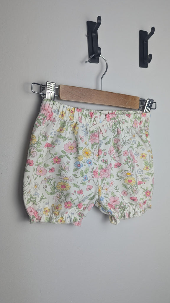 NEW Next Cream Floral Shorts - Girls 6-9 Months Little Ones Preloved Used, Preloved, Preworn & Second Hand Baby, Kids & Children's Clothing UK Online. Cheap affordable. Brands including Next, Joules, Nutmeg Morrisons, TU, F&F, H&M.