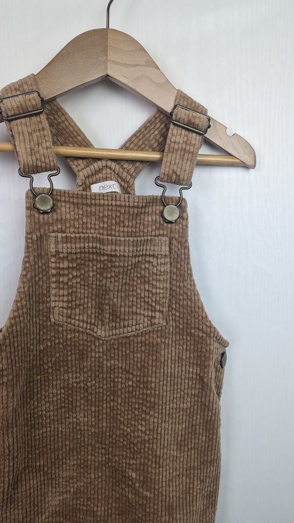 Next Beige Cord Dungaree Dress - Girls 18-24 Months Next Used, Preloved, Preworn & Second Hand Baby, Kids & Children's Clothing UK Online. Cheap affordable. Brands including Next, Joules, Nutmeg Morrisons, TU, F&F, H&M.