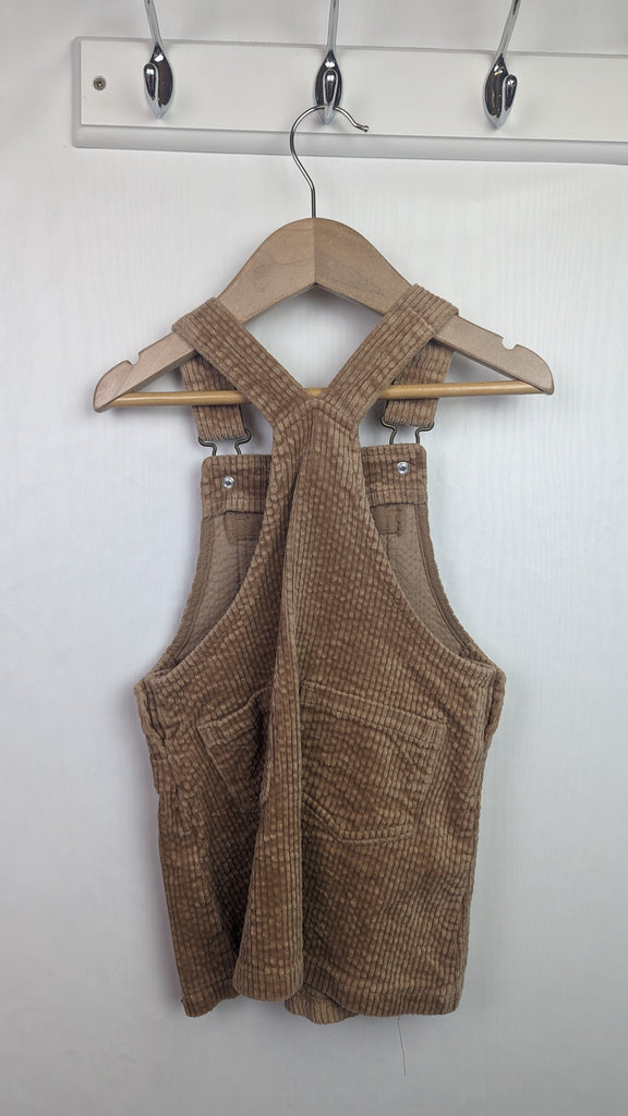 Next Beige Cord Dungaree Dress - Girls 18-24 Months Next Used, Preloved, Preworn & Second Hand Baby, Kids & Children's Clothing UK Online. Cheap affordable. Brands including Next, Joules, Nutmeg Morrisons, TU, F&F, H&M.