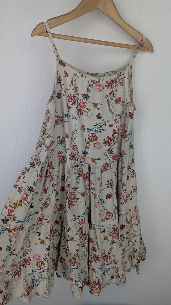 Next Beige Floral Tiered Dress - Girls 9 Years Little Ones Preloved Used, Preloved, Preworn & Second Hand Baby, Kids & Children's Clothing UK Online. Cheap affordable. Brands including Next, Joules, Nutmeg Morrisons, TU, F&F, H&M.