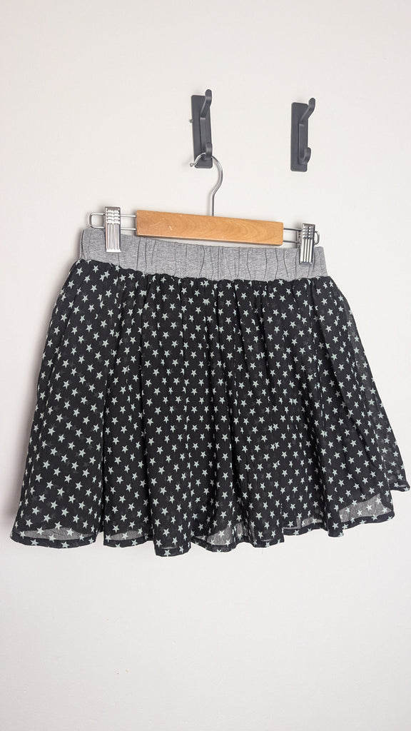 Next Black Layered Star Skirt - Girls 9 Years Little Ones Preloved Used, Preloved, Preworn & Second Hand Baby, Kids & Children's Clothing UK Online. Cheap affordable. Brands including Next, Joules, Nutmeg Morrisons, TU, F&F, H&M.