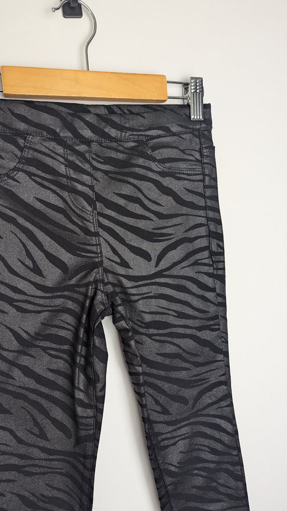 Next Black Shiny Animal Print Jeans - Girls 9 Years Little Ones Preloved Used, Preloved, Preworn & Second Hand Baby, Kids & Children's Clothing UK Online. Cheap affordable. Brands including Next, Joules, Nutmeg Morrisons, TU, F&F, H&M.