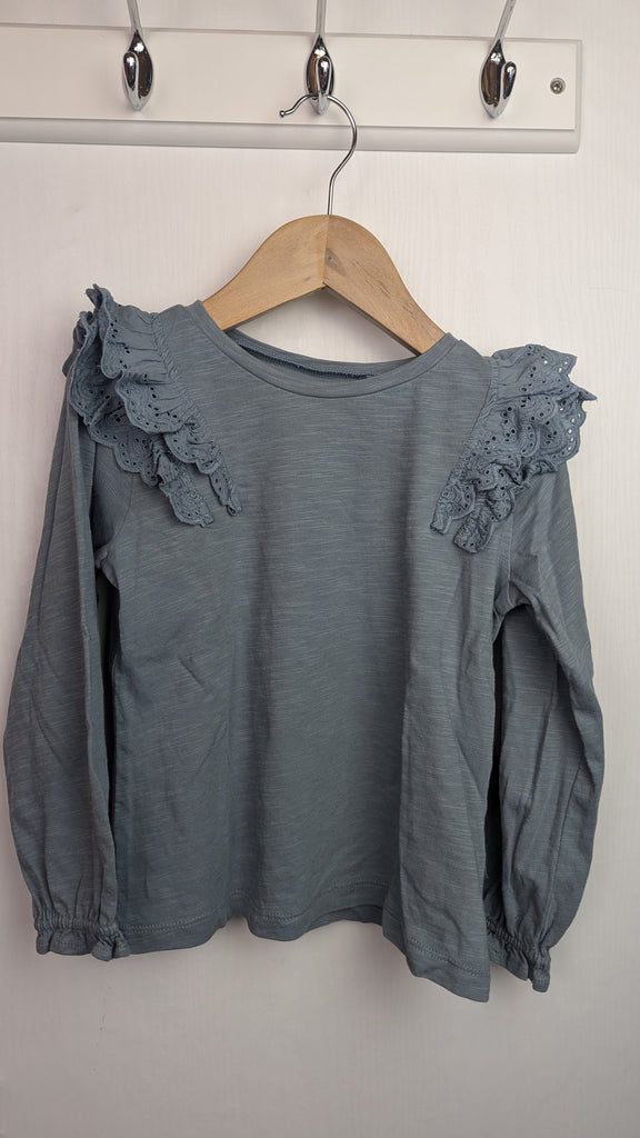 Next Blue Ruffle Shoulder Top - Girls 3-4 Years Little Ones Preloved Used, Preloved, Preworn & Second Hand Baby, Kids & Children's Clothing UK Online. Cheap affordable. Brands including Next, Joules, Nutmeg Morrisons, TU, F&F, H&M.