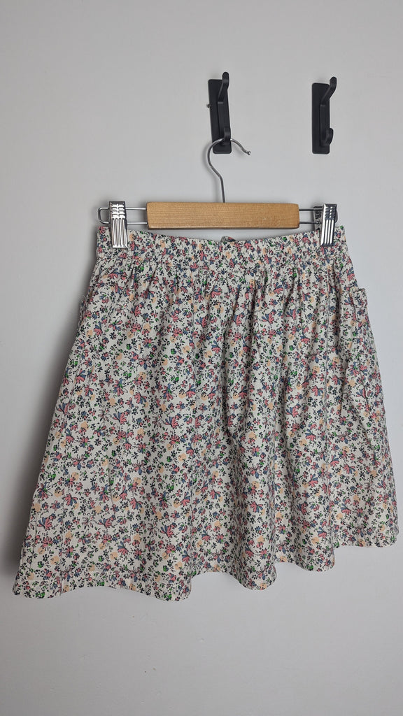 Next Cream Floral Skirt - Girls 9 Years Little Ones Preloved Used, Preloved, Preworn & Second Hand Baby, Kids & Children's Clothing UK Online. Cheap affordable. Brands including Next, Joules, Nutmeg Morrisons, TU, F&F, H&M.