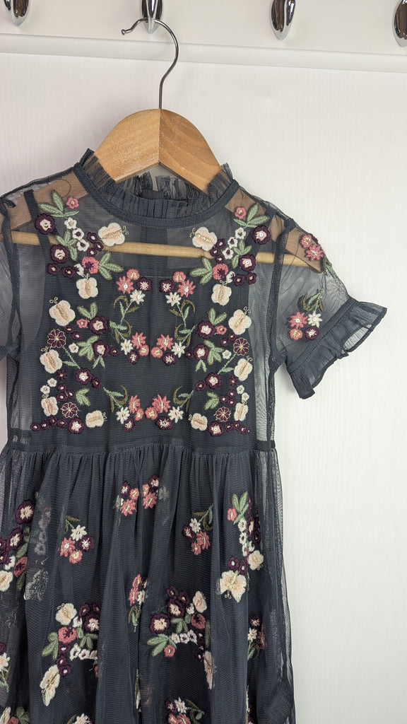 Next Dark Grey Floral Mesh Ocassion Dress - Girls 4 Years Little Ones Preloved Used, Preloved, Preworn Baby, Girls & Boys Clothes. Kids & Children's second hand Clothing UK Online. Cheap affordable. Brands including Next, Joules, Nutmeg Morrisons, TU, F&F, H&M.