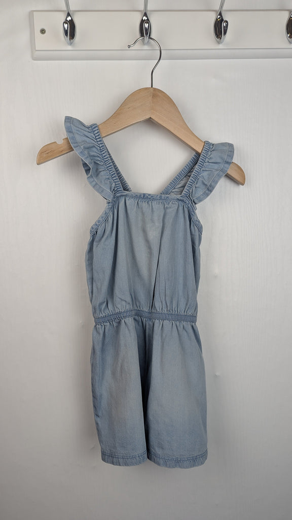 Next Denim Playsuit - Girls 18-24 Months Little Ones Preloved Used, Preloved, Preworn Baby, Girls & Boys Clothes. Kids & Children's second hand Clothing UK Online. Cheap affordable. Brands including Next, Joules, Nutmeg Morrisons, TU, F&F, H&M.