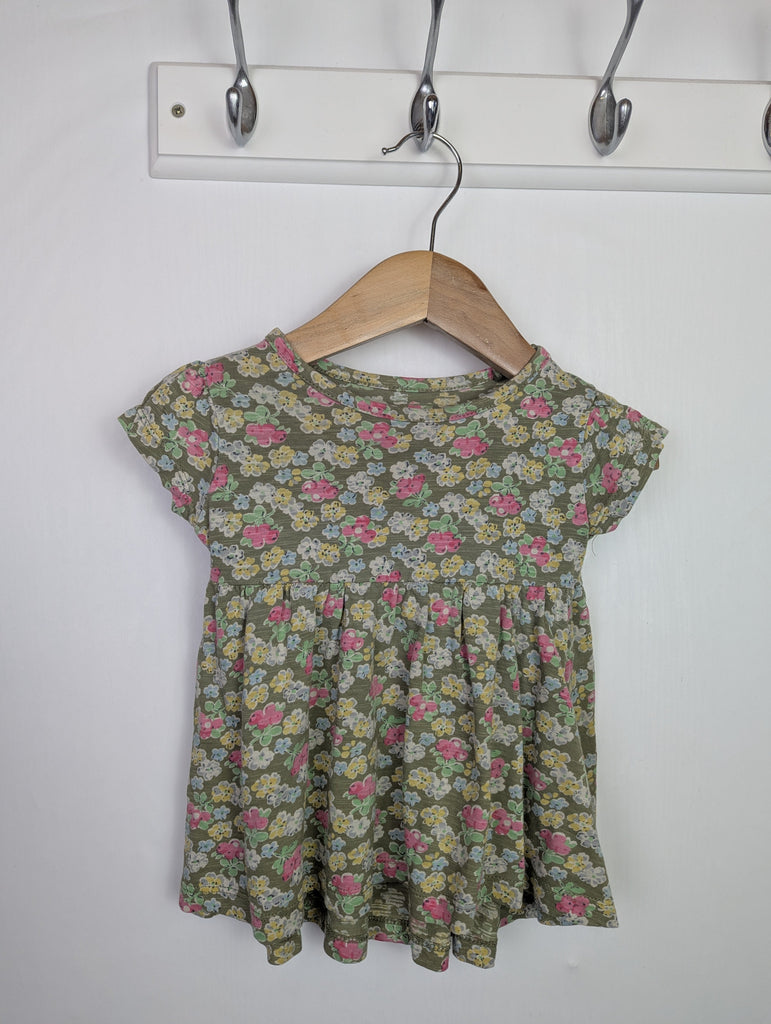 Next Green Floral Dress - Girls 6-9 Months Little Ones Preloved Used, Preloved, Preworn Baby, Girls & Boys Clothes. Kids & Children's second hand Clothing UK Online. Cheap affordable. Brands including Next, Joules, Nutmeg Morrisons, TU, F&F, H&M.