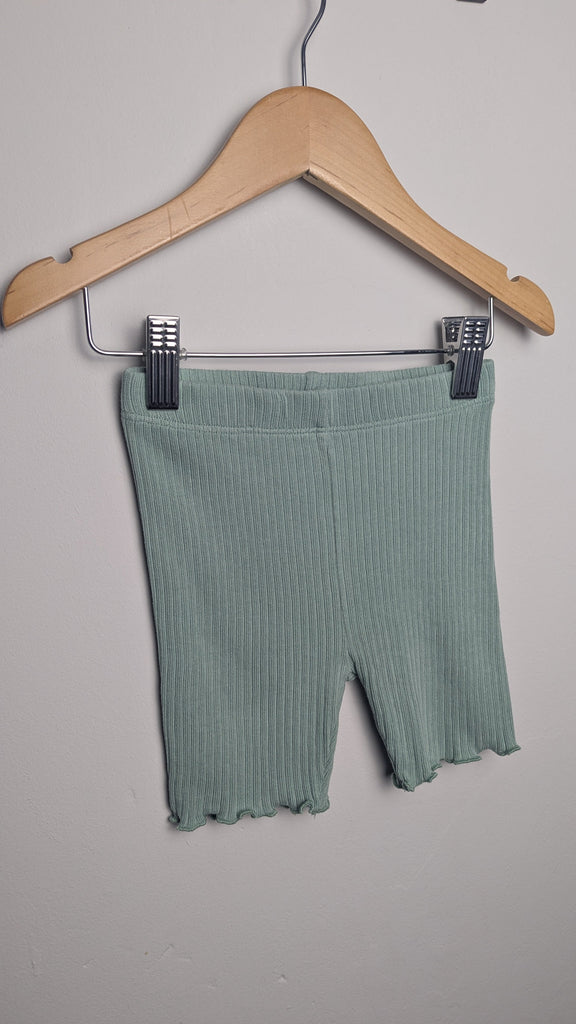 Next Green Ribbed Cycle Shorts - Girls 2-3 Years Little Ones Preloved Used, Preloved, Preworn & Second Hand Baby, Kids & Children's Clothing UK Online. Cheap affordable. Brands including Next, Joules, Nutmeg Morrisons, TU, F&F, H&M.