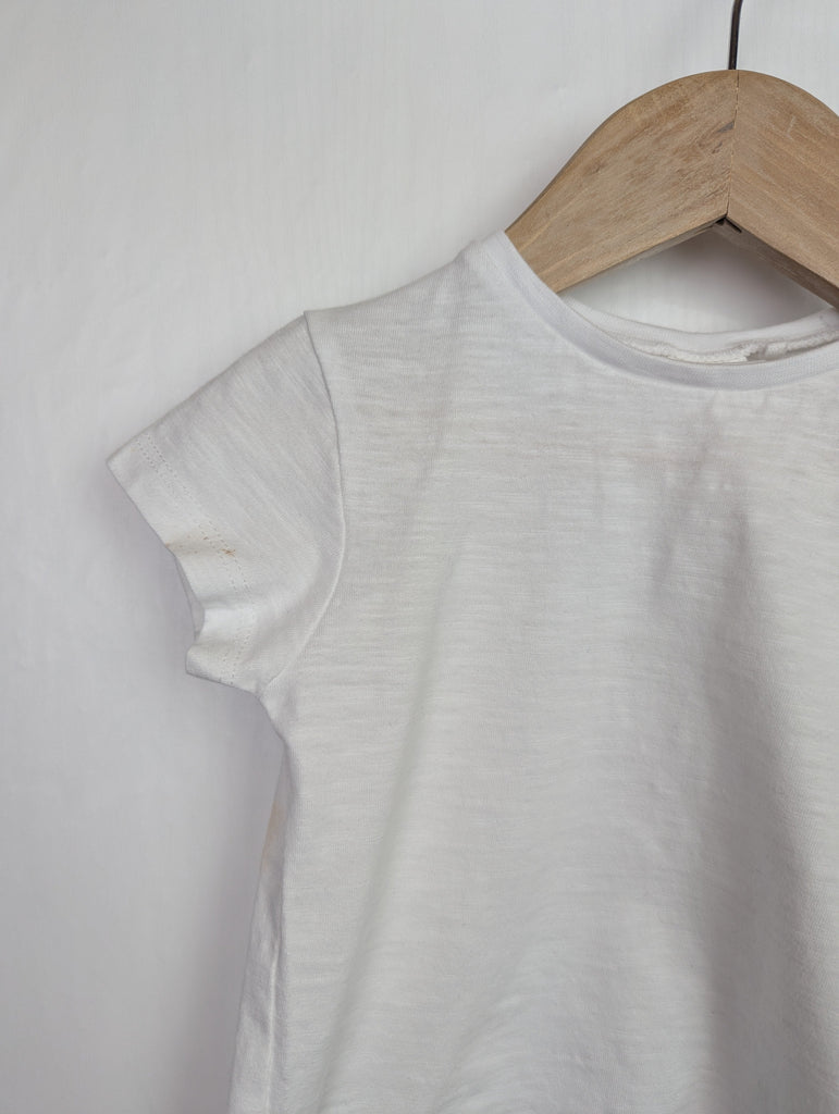 Next Plain White T-Shirt - Unisex 9-12 Months Little Ones Preloved Used, Preloved, Preworn Baby, Girls & Boys Clothes. Kids & Children's second hand Clothing UK Online. Cheap affordable. Brands including Next, Joules, Nutmeg Morrisons, TU, F&F, H&M.