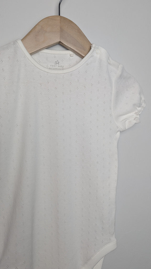 Next White Eyelet Bodysuit - Girls 18-24 months Little Ones Preloved Used, Preloved, Preworn Baby, Girls & Boys Clothes. Kids & Children's second hand Clothing UK Online. Cheap affordable. Brands including Next, Joules, Nutmeg Morrisons, TU, F&F, H&M.